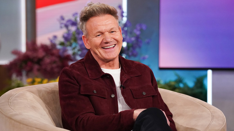 Gordon Ramsay smiling on talk show.
