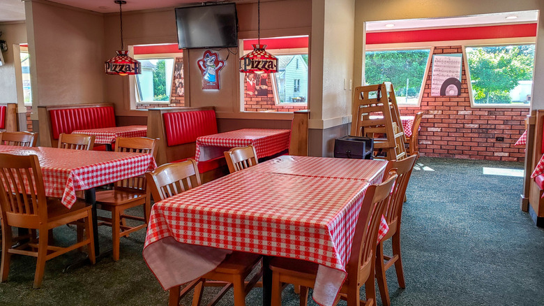 An empty Pizza Hut dining room.