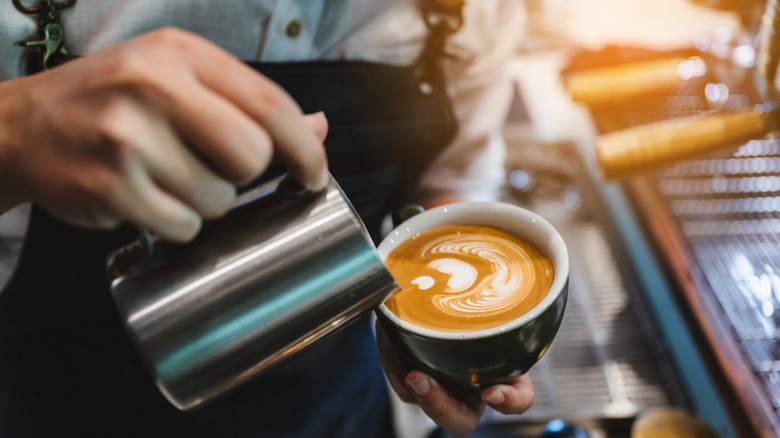 Barista making coffee