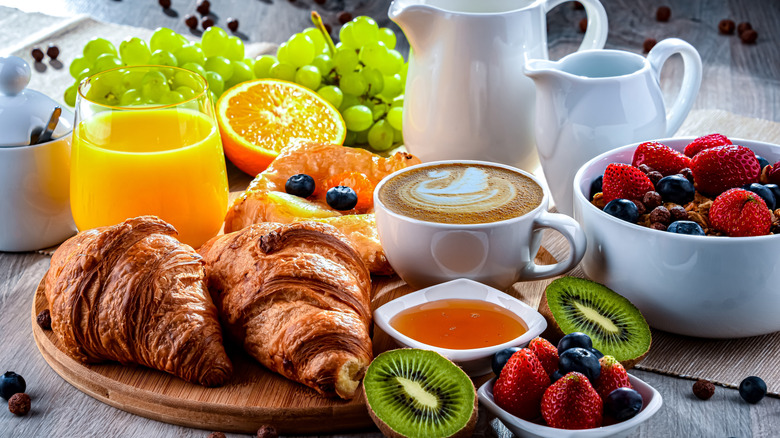 Breakfast pastries, fruit, and juice