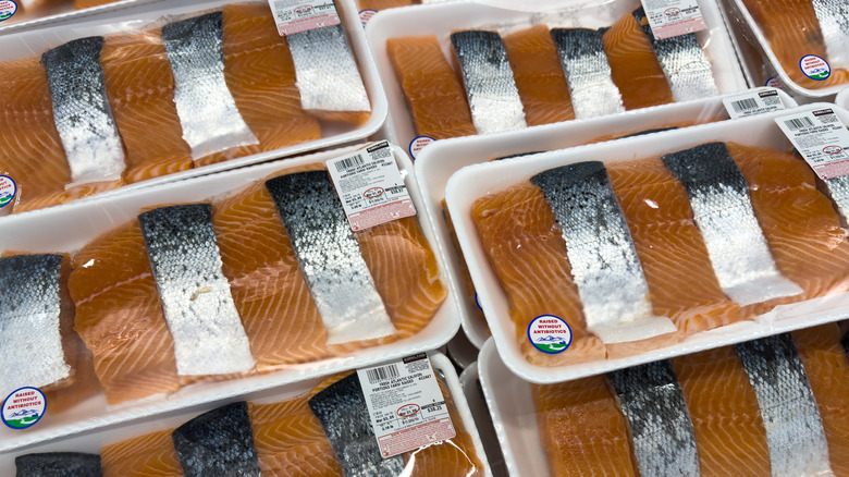 Packages of Costco's farmed Atlantic salmon with brownish meat that should be more pink
